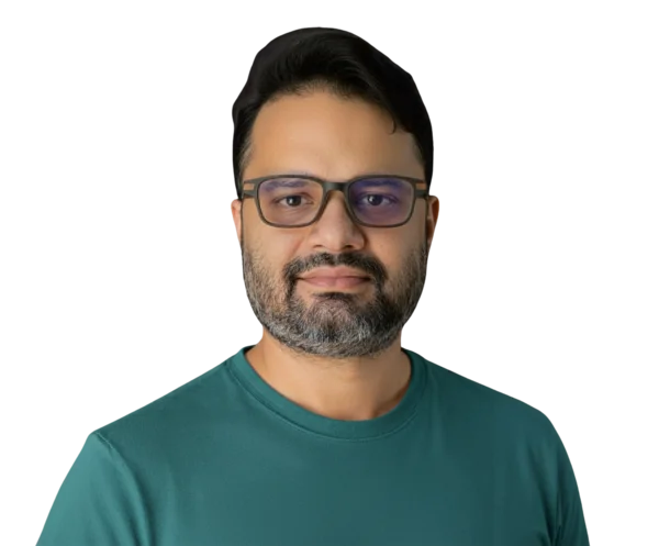 Abhi, founder of dmvapt, wearing a teal shirt